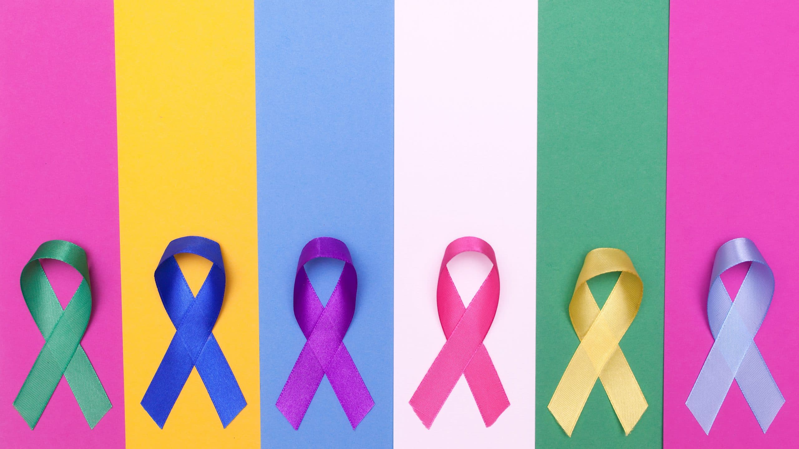 World,Cancer,Day,Background.,Colorful,Ribbons,,Cancer,Awareness.,Multi-colored,Surface.