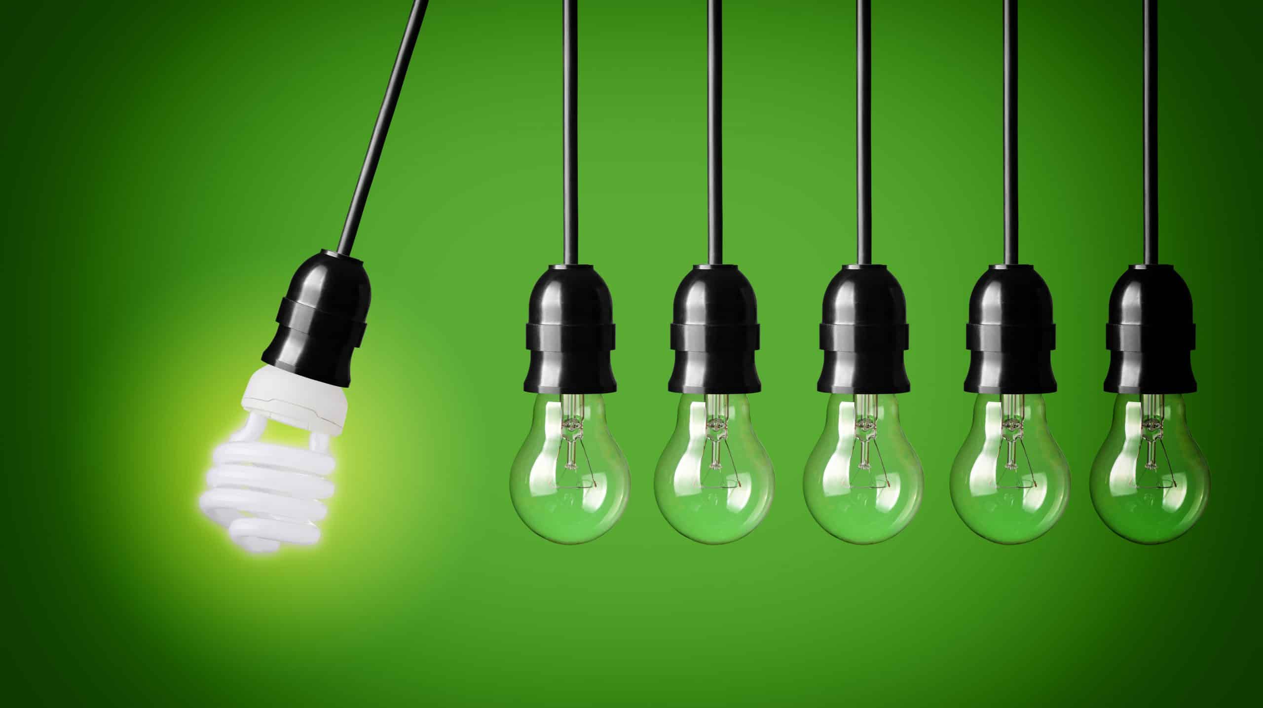Perpetual,Motion,With,Light,Bulbs,And,Energy,Saver,Bulb.,Idea